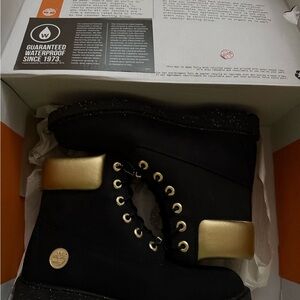 Timberland Women's Black and Gold Combat Boots